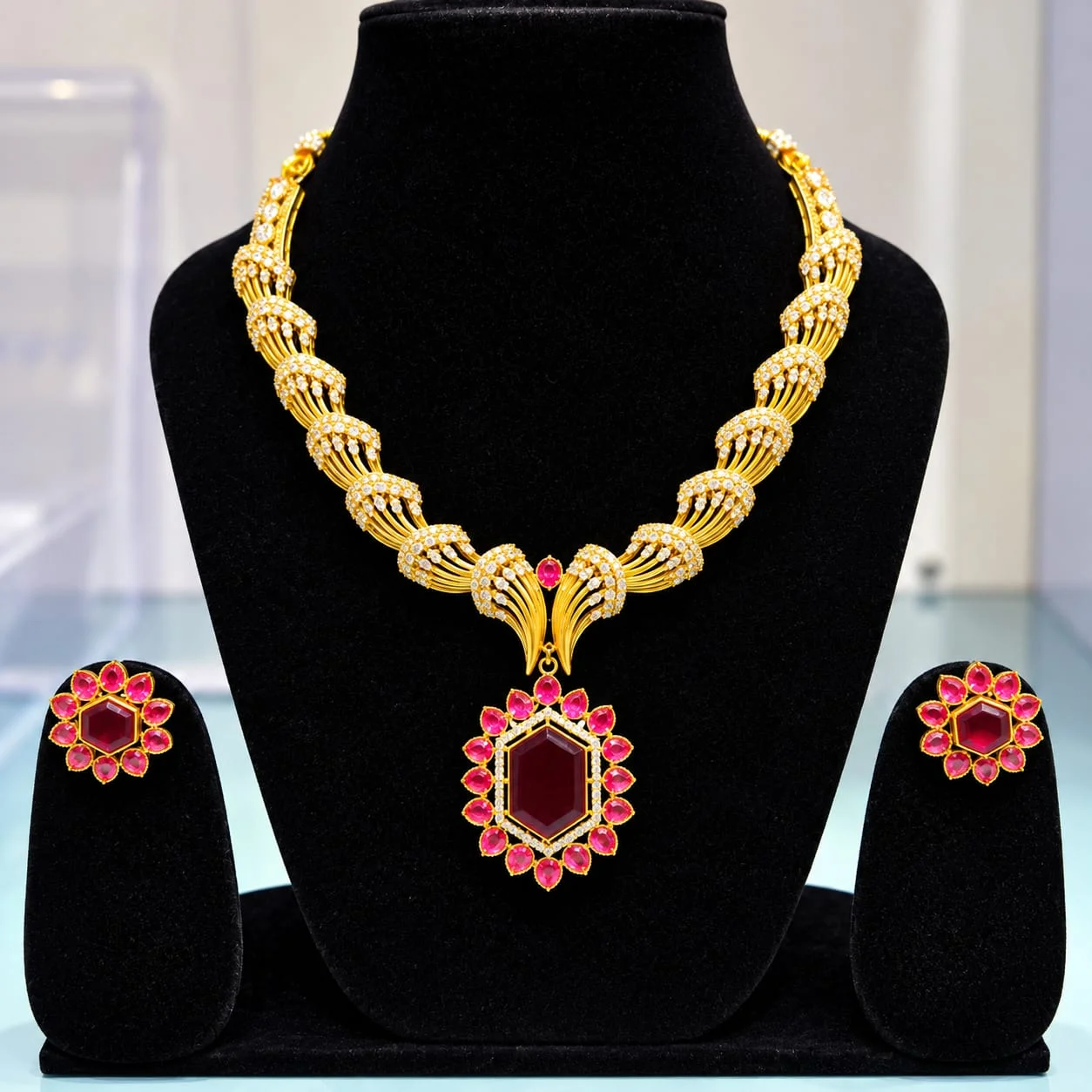 Maharani Ruby Red Gemstone & CZ Studded Gold Twisted Collar Necklace Set